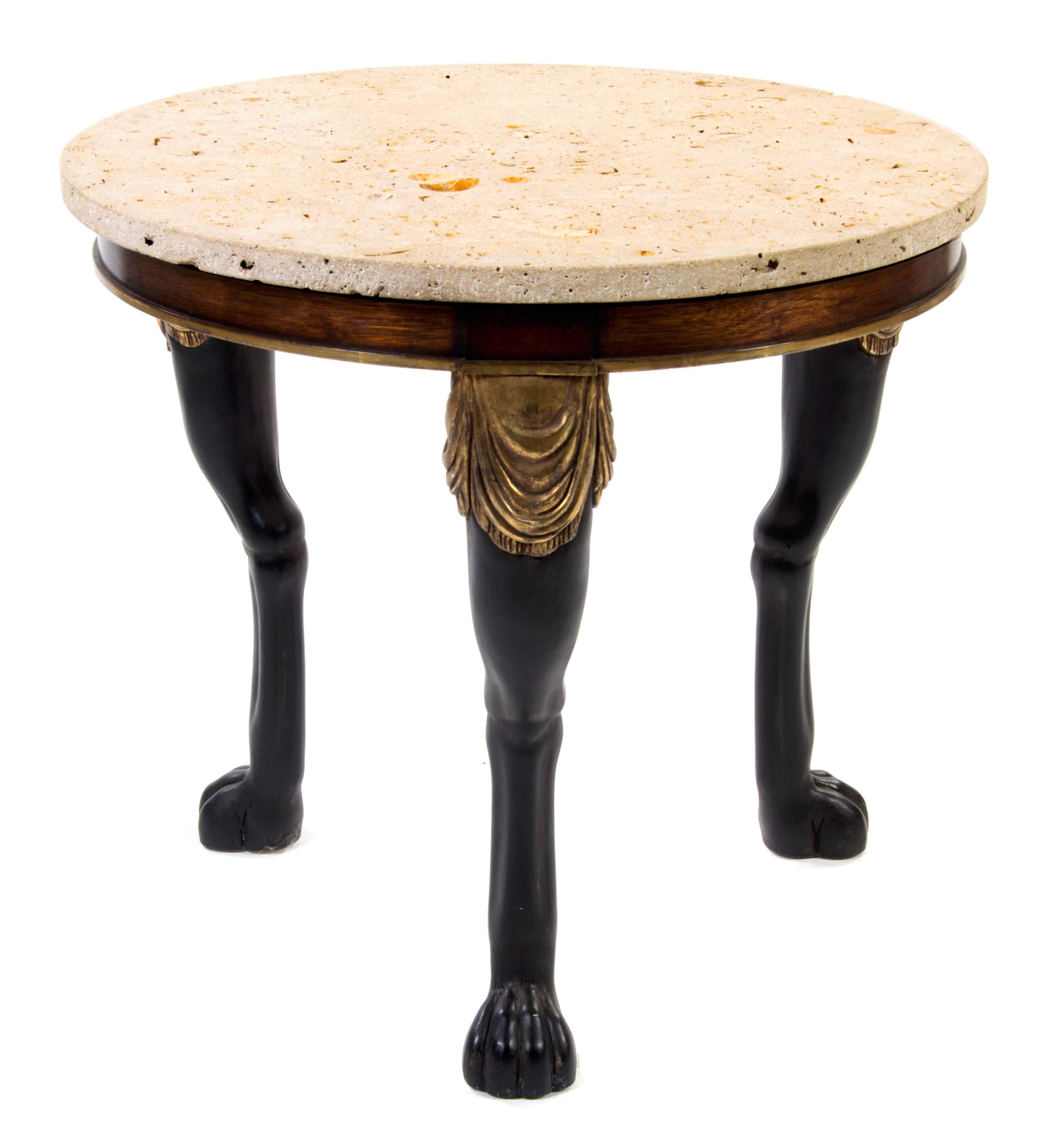 An Empire Style Ebonized and Gilt Center Table, Height 29 1/2 x diameter 32 inches.