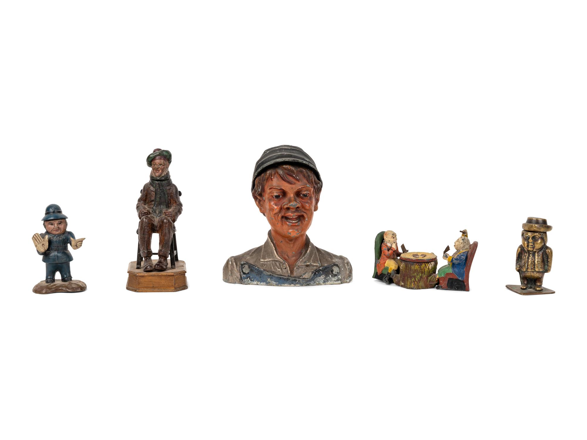 A Group of Five Cast Metal Figural Inkwells