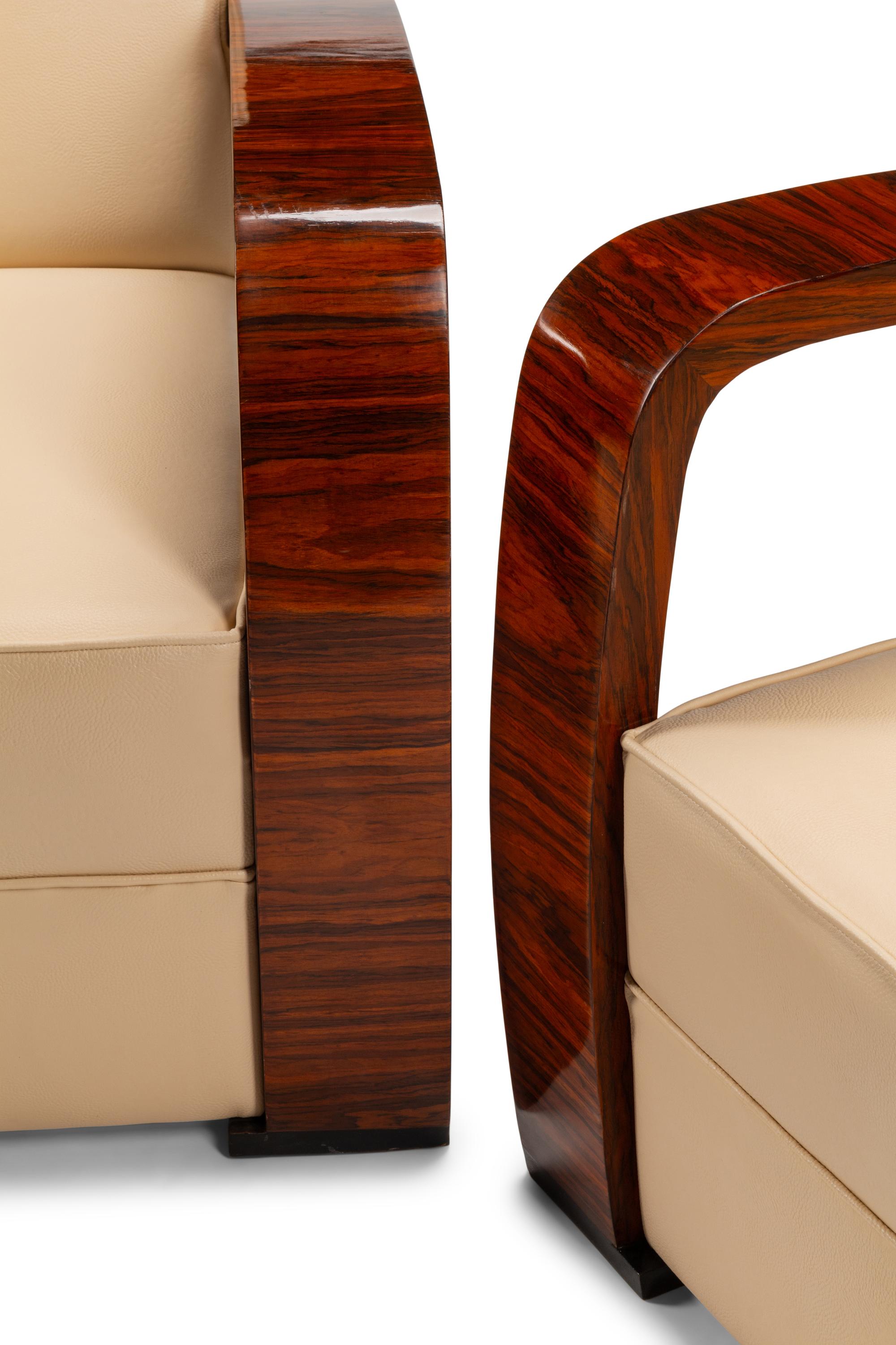 A Pair of Art Deco Style Rosewood Lounge Chairs