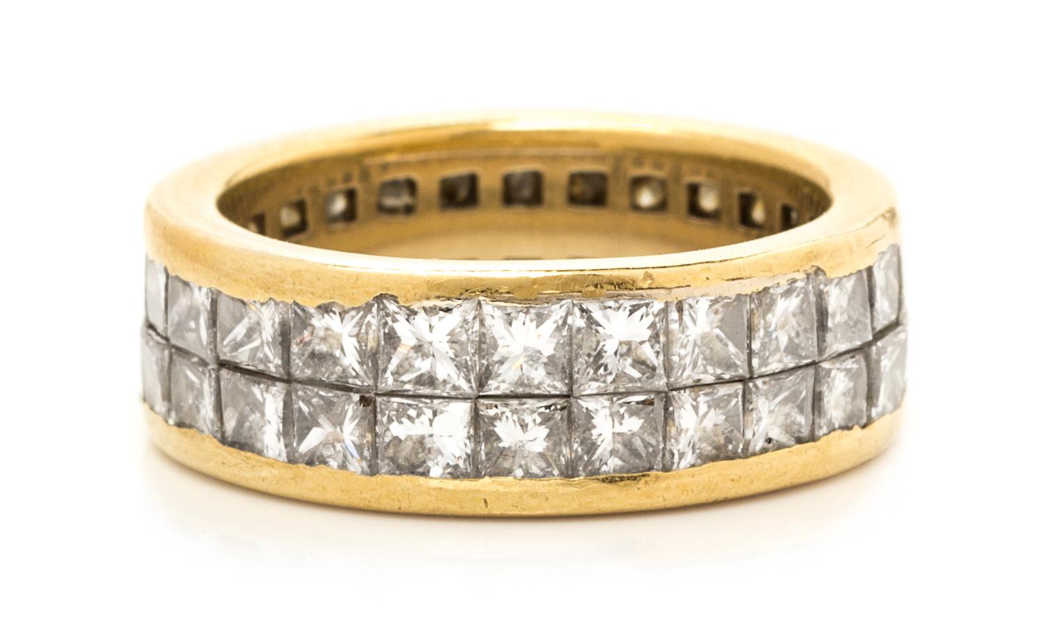 An 18 Karat Yellow Gold and Diamond Eternity Band, 4.10 dwts.