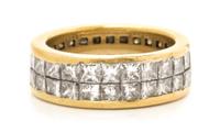 An 18 Karat Yellow Gold and Diamond Eternity Band, 4.10 dwts.