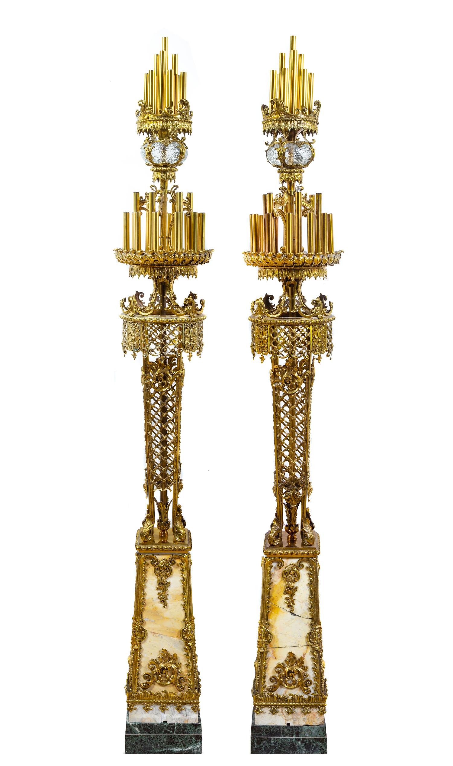 A Pair of Monumental Gilt Bronze and Marble Torcheres from Chicago's Uptown Theater