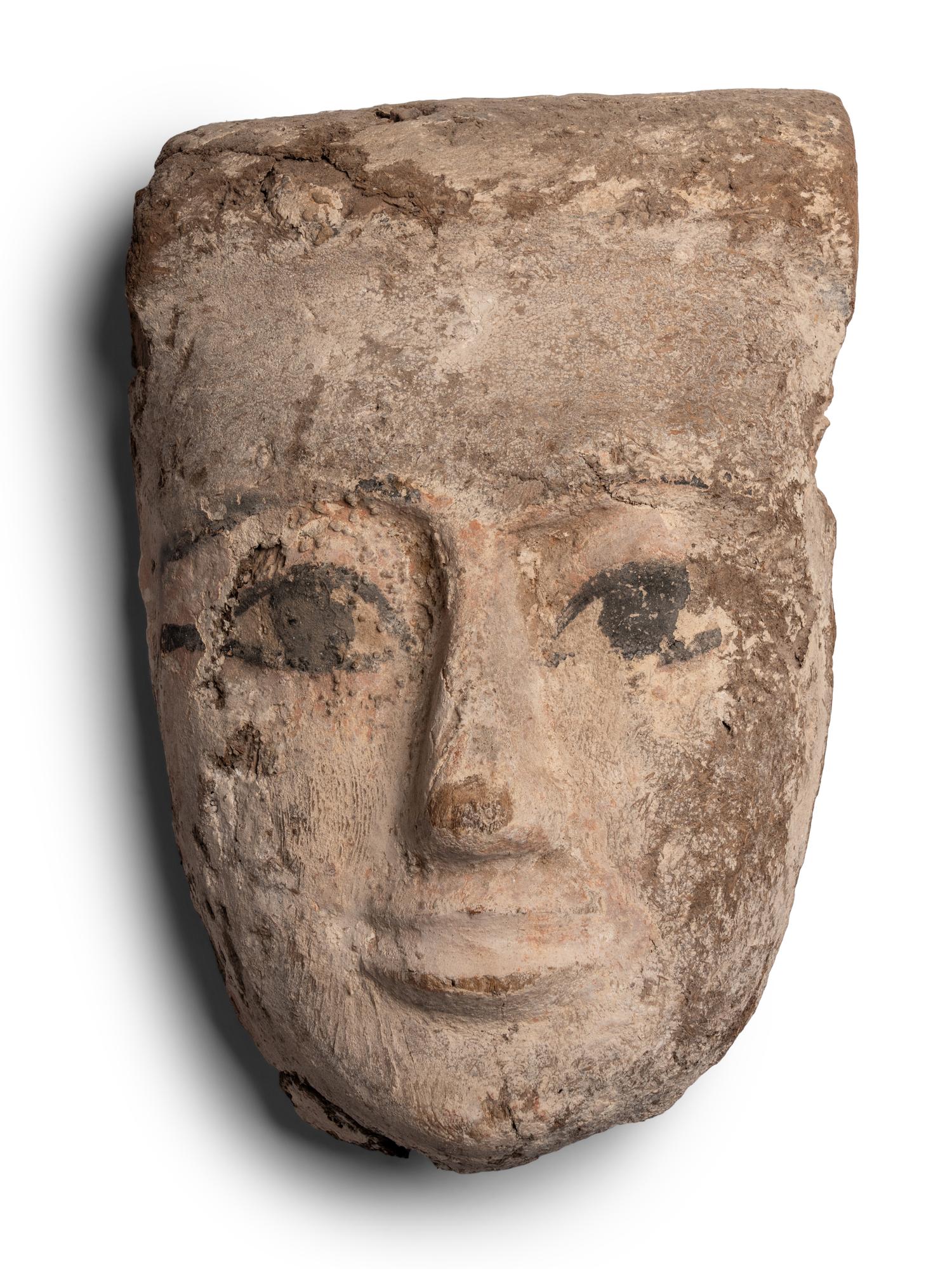 An Egyptian Painted Wood Mummy Mask