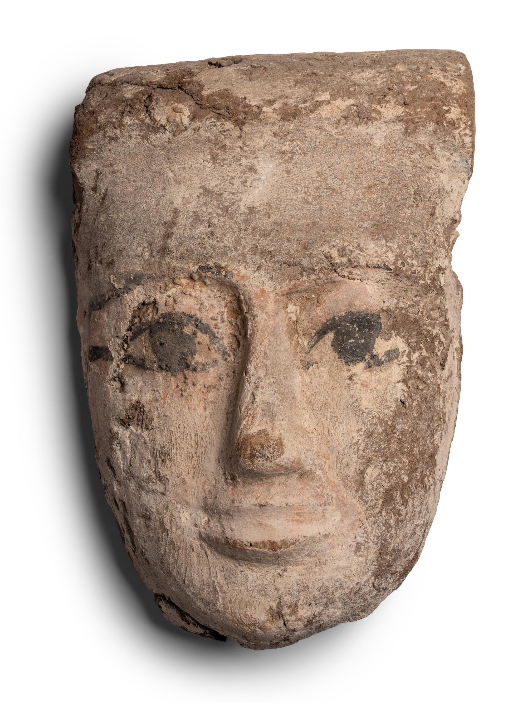 An Egyptian Painted Wood Mummy Mask