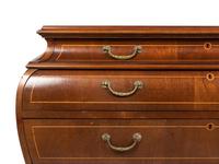 A Louis XV Style Walnut Bombe Commode