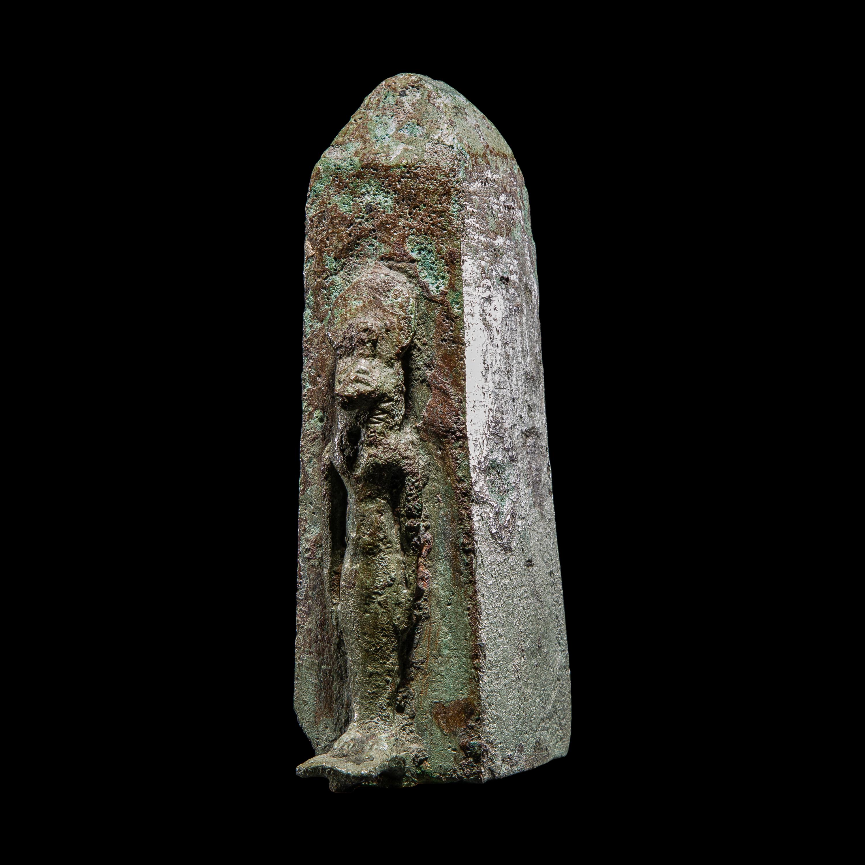 An Egyptian Bronze Lion-Headed Goddess and Obelisk