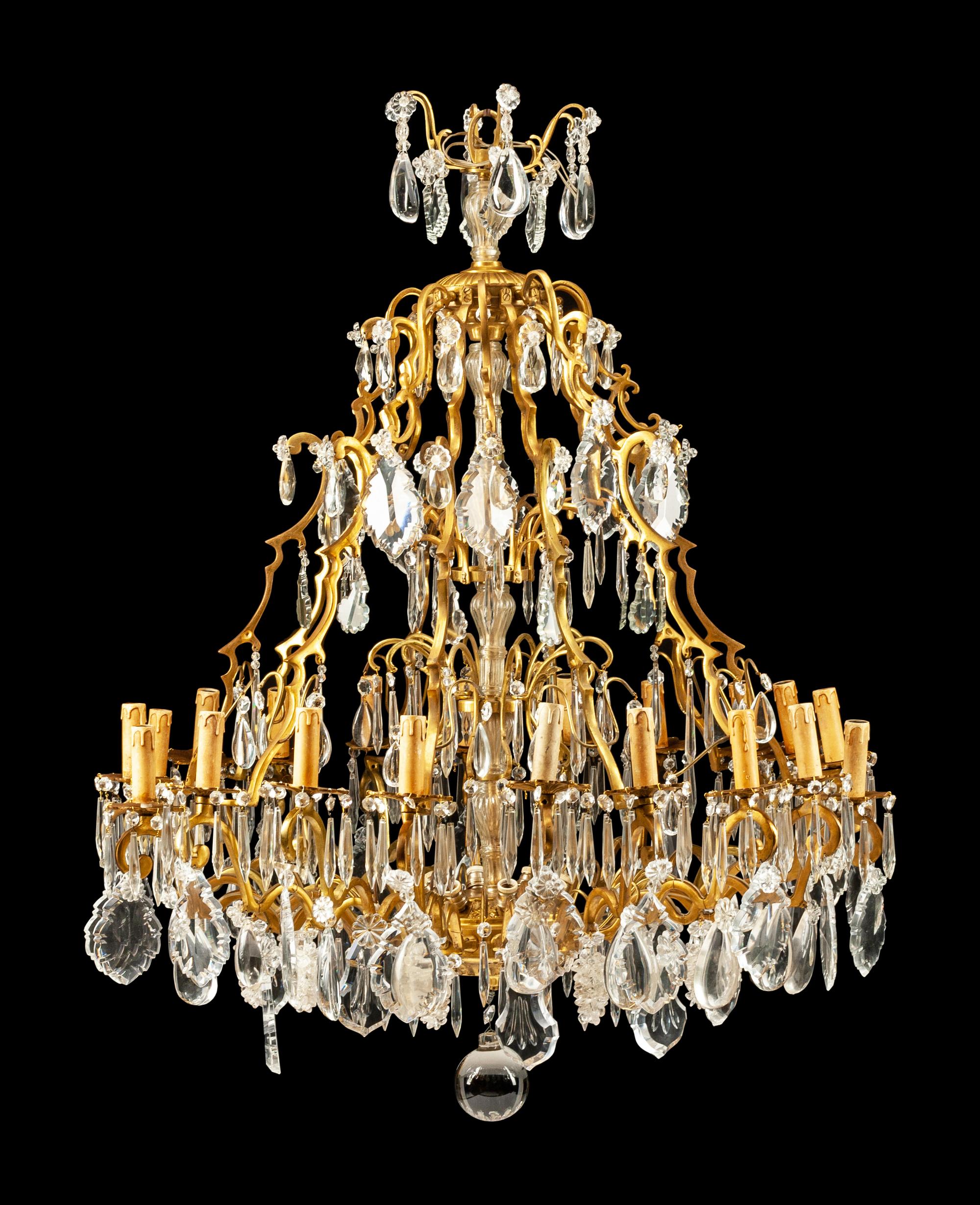 A Louis XV Style Gilt Bronze and Cut Glass Twenty-Eight-Light Chandelier
