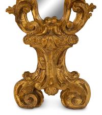 A Venetian Rococo Style Giltwood Mirror