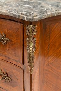 A Louis XV Gilt Bronze Mounted Tulipwood and Marble-Top Commode