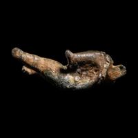 A Roman Bronze Seated Child