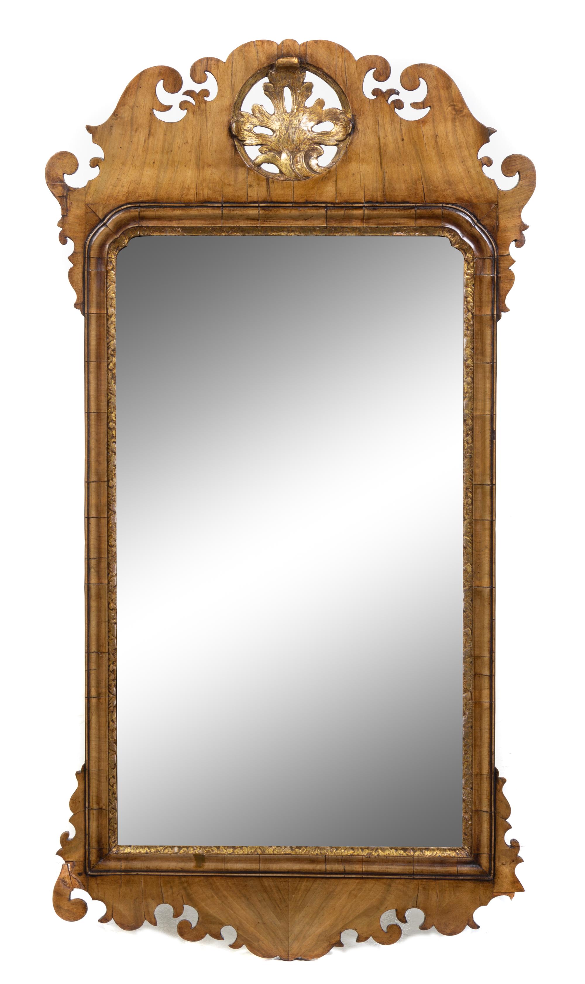 A George III Style Parcel Gilt Mahogany Mirror Height 41 1/4 x width 21 3/4 inches. — 18TH/19TH CENTURY