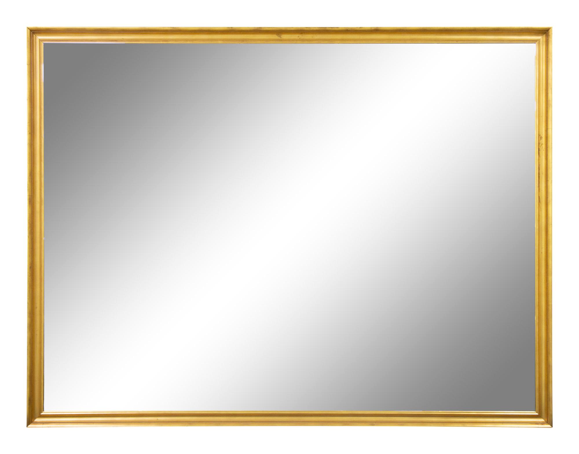 An Oversized Giltwood Mirror