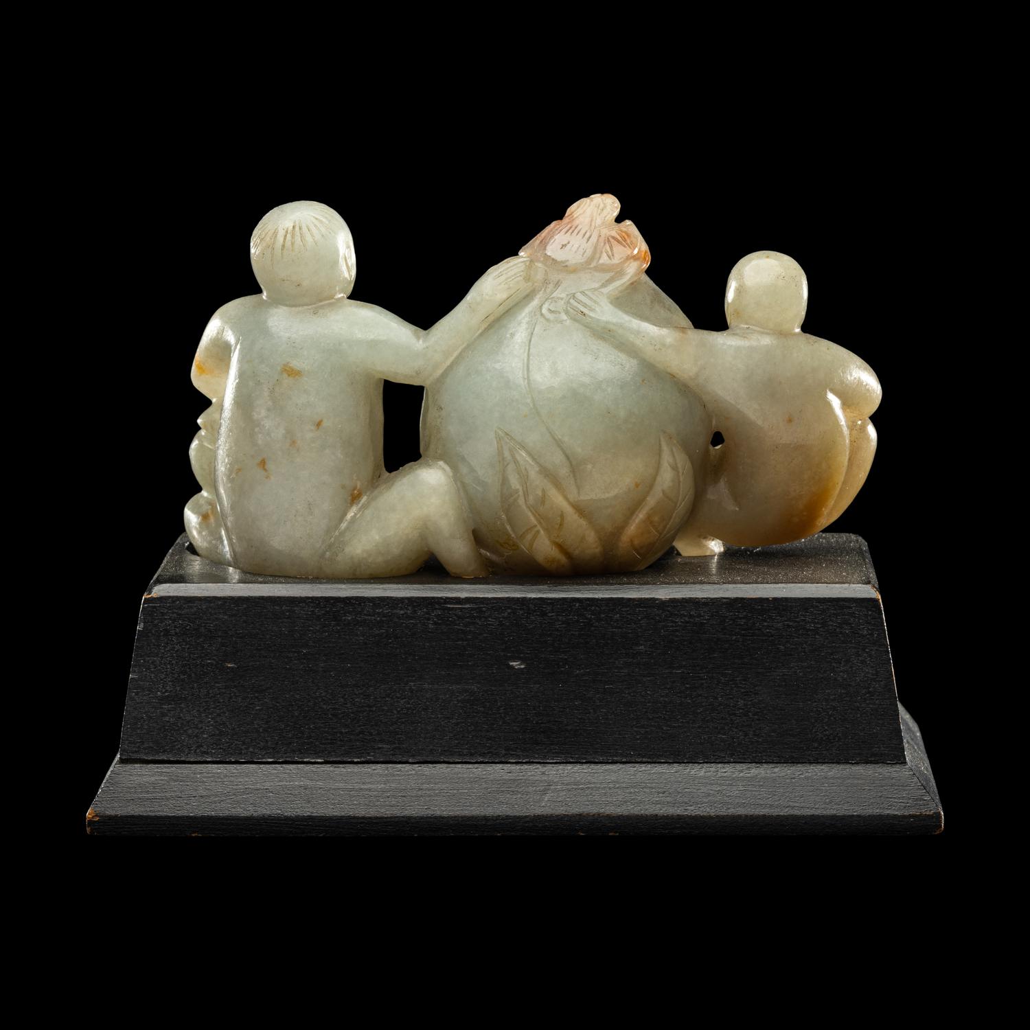 A Chinese Green Jadeite Figural Group of Monkeys and Peach