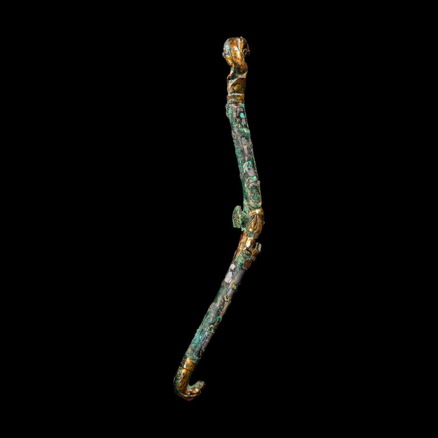 A Chinese Gilt, Silvered and Turquoise Inlaid Bronze Belt Hook, Warring States Period 戰國 銅 鎏金錯銀嵌松石雙獸首帶鉤