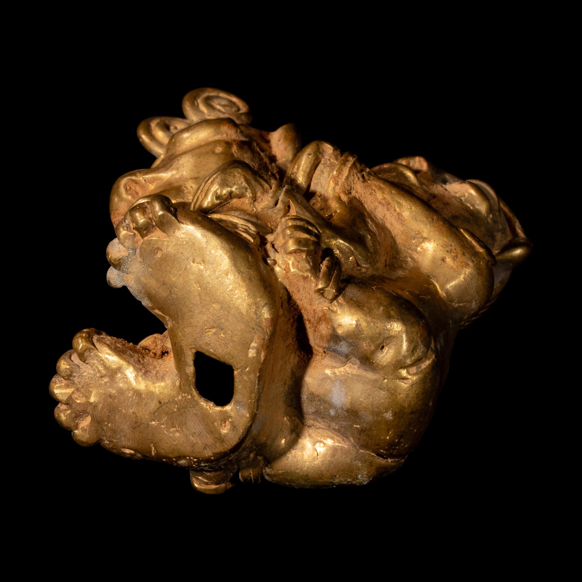 A Tairona Tumbaga Mother and Child Figure