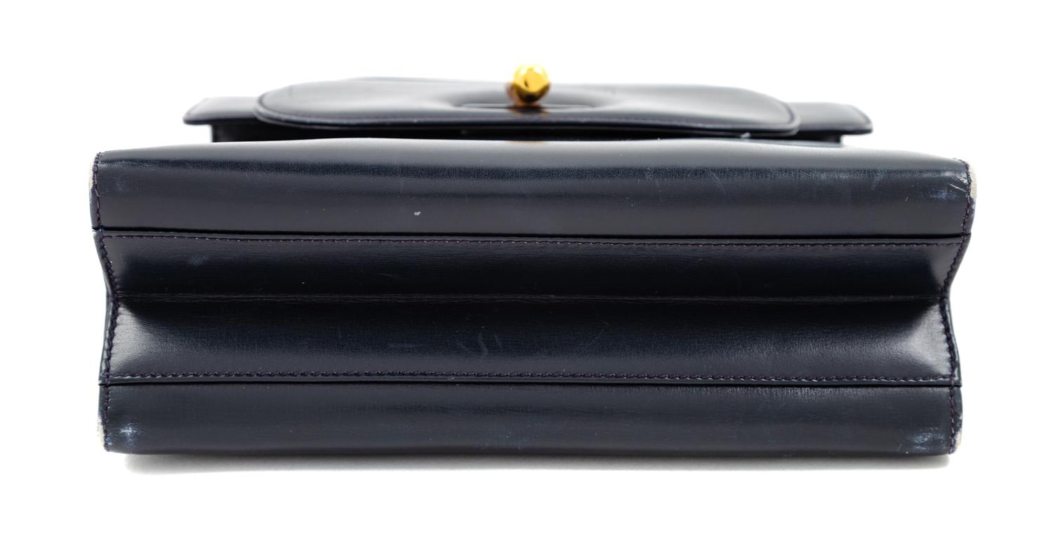 A Gucci Navy Leather Vintage Flap Handbag, 7.25" H x 8" W x 2.75" D; Handle drop: 4".
