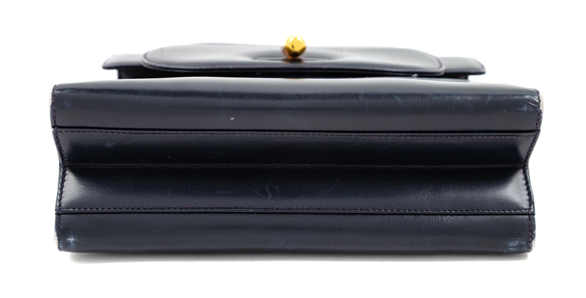 A Gucci Navy Leather Vintage Flap Handbag, 7.25" H x 8" W x 2.75" D; Handle drop: 4".