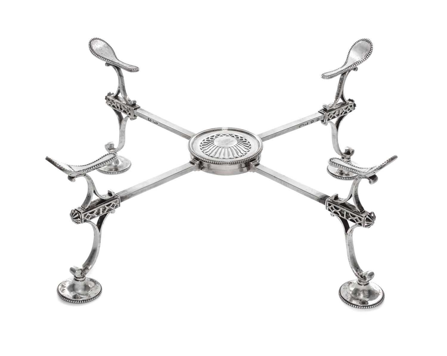 A George III Silver Dish Cross, Burrage Davenport, London, 1779, of typical adjustable form, with beaded circular feet.
