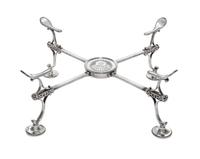 A George III Silver Dish Cross, Burrage Davenport, London, 1779, of typical adjustable form, with beaded circular feet.