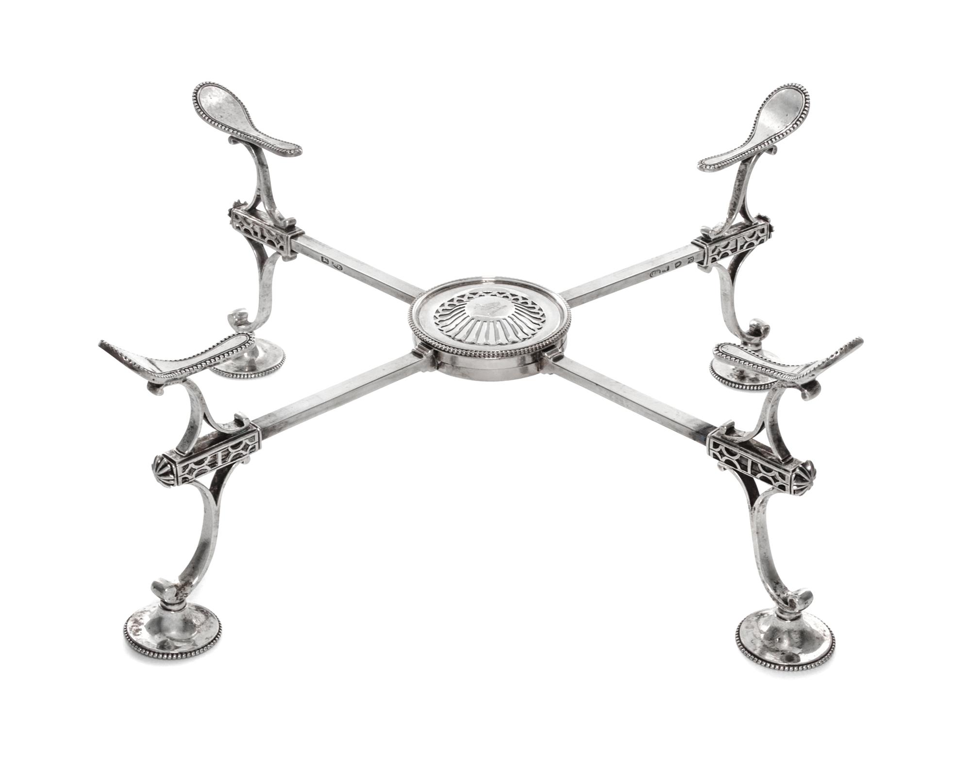 A George III Silver Dish Cross, Burrage Davenport, London, 1779, of typical adjustable form, with beaded circular feet.
