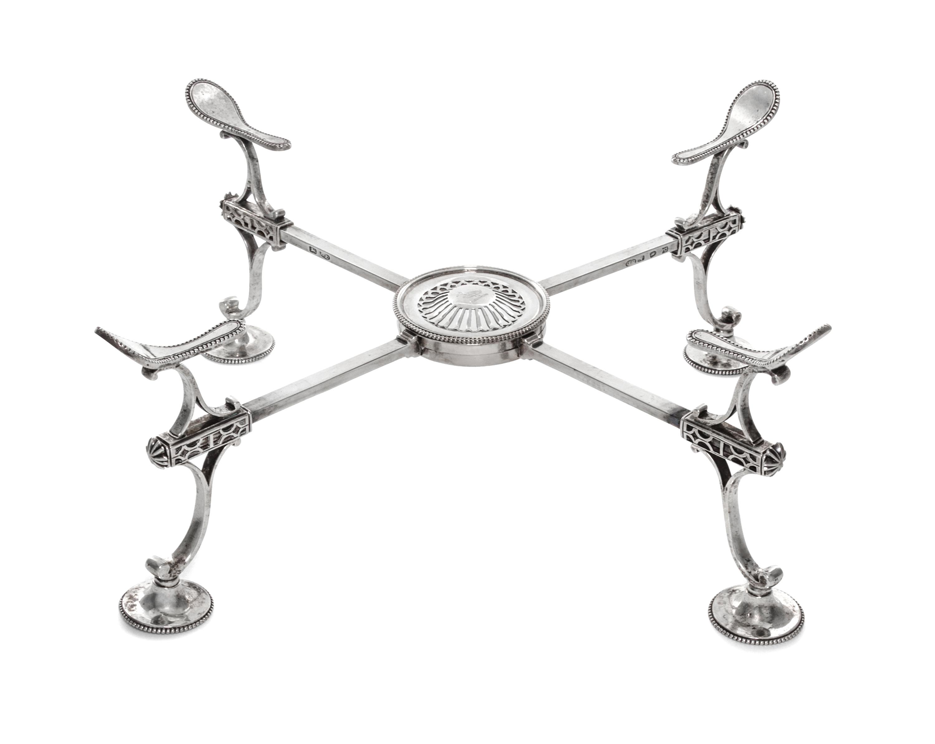 A George III Silver Dish Cross, Burrage Davenport, London, 1779, of typical adjustable form, with beaded circular feet.