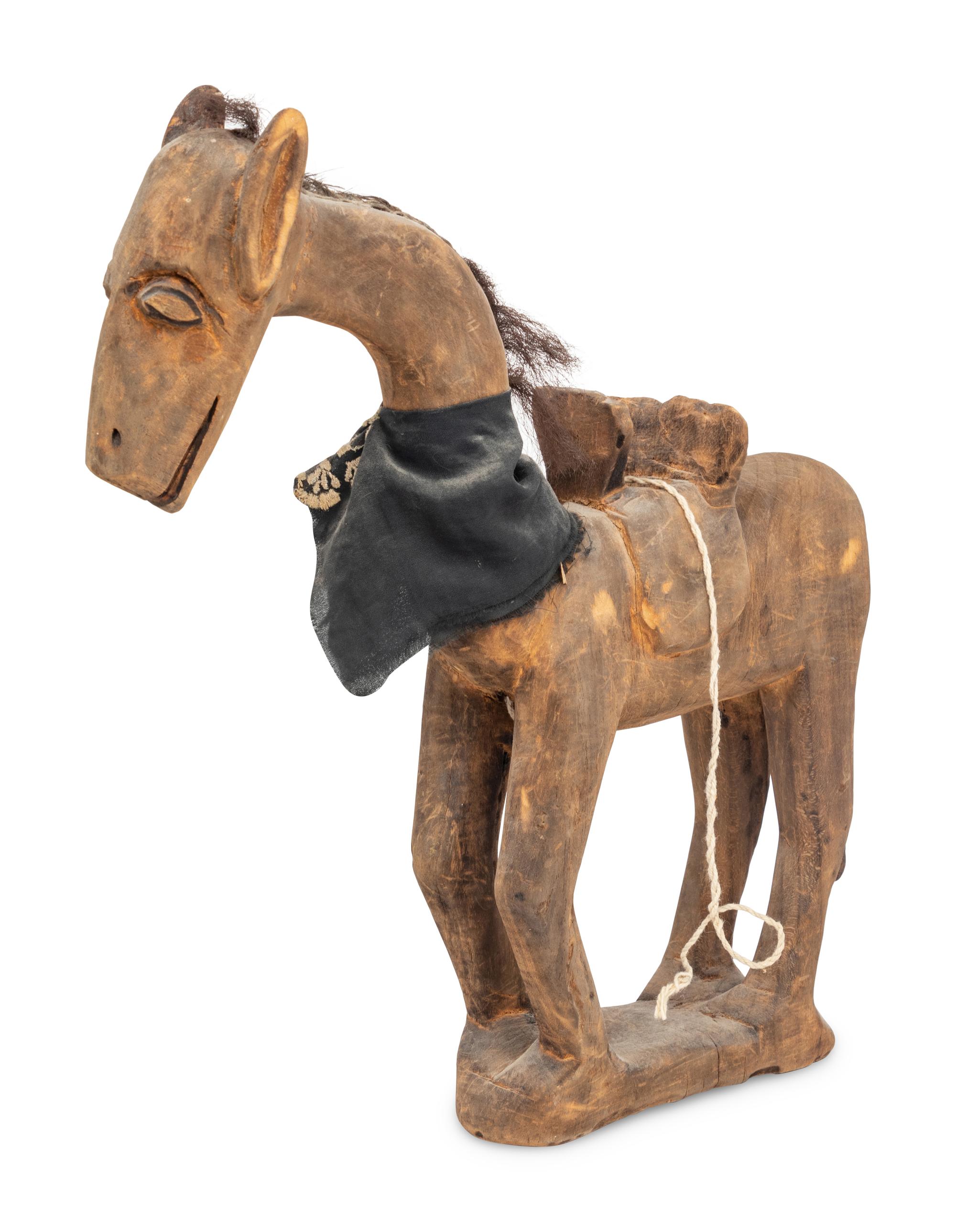 A Carved Wood Horse with Articulated Head