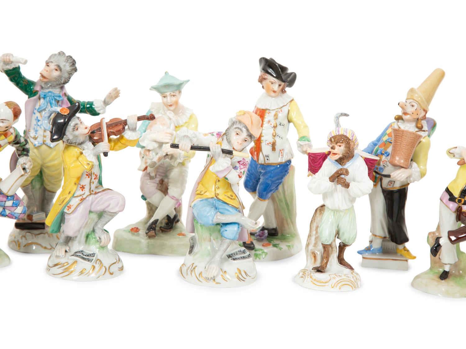 A Large Group of Meissen and Dresden Porcelain Figures