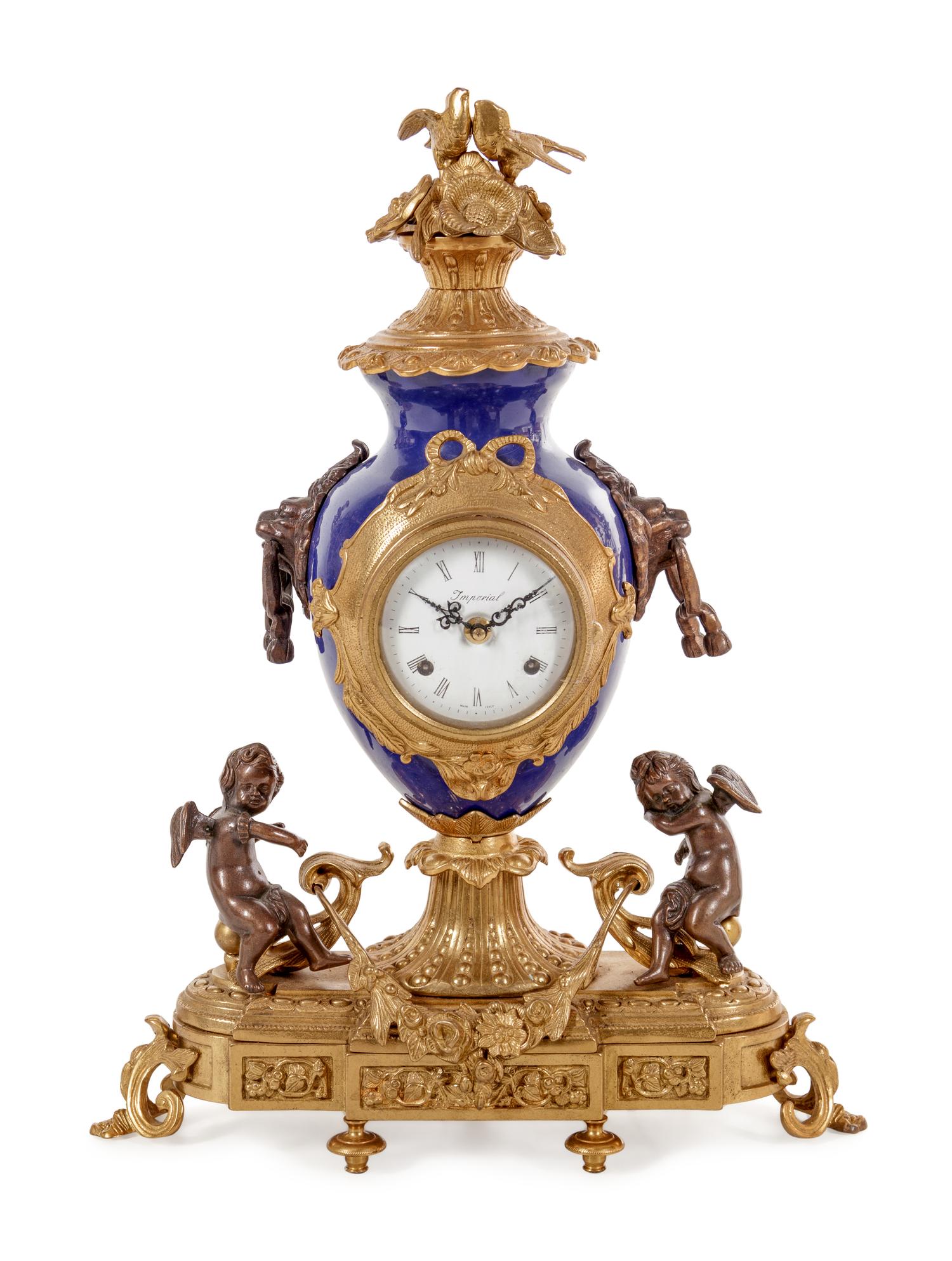 A Napoleon III Style Gilt Bronze Mounted Cobalt Porcelain Clock Garniture