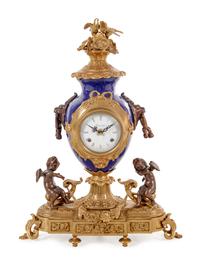 A Napoleon III Style Gilt Bronze Mounted Cobalt Porcelain Clock Garniture