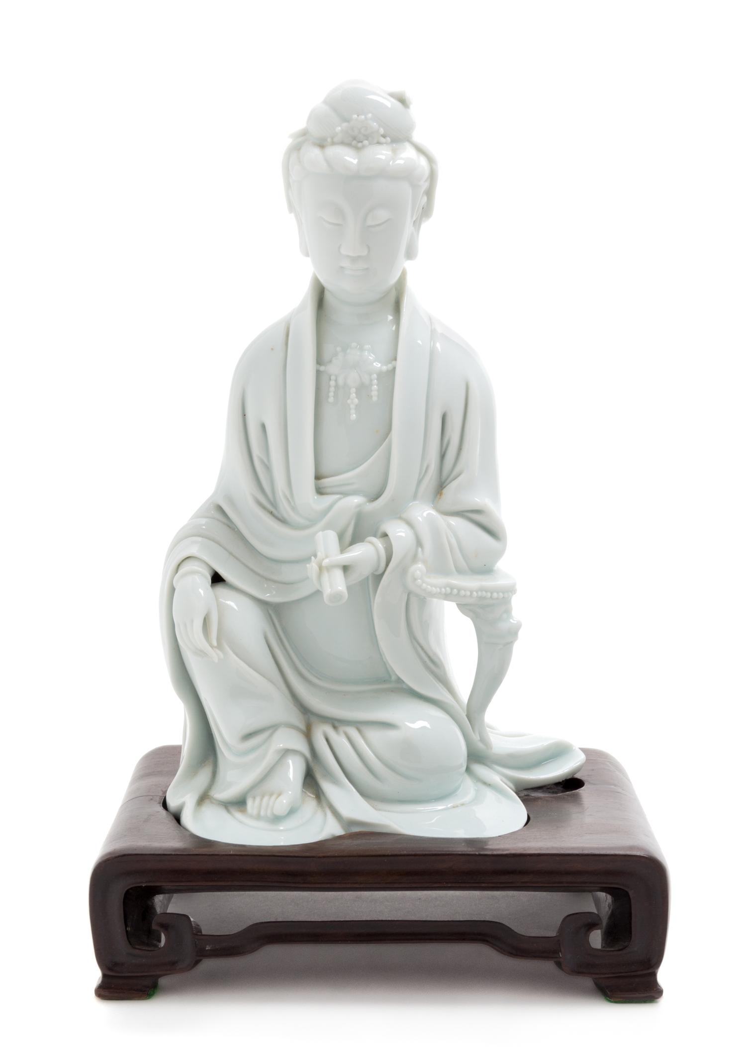 A Blanc-de-Chine Porcelain Figure of Guanyin Height 8 1/2 inches. — 20TH CENTURY