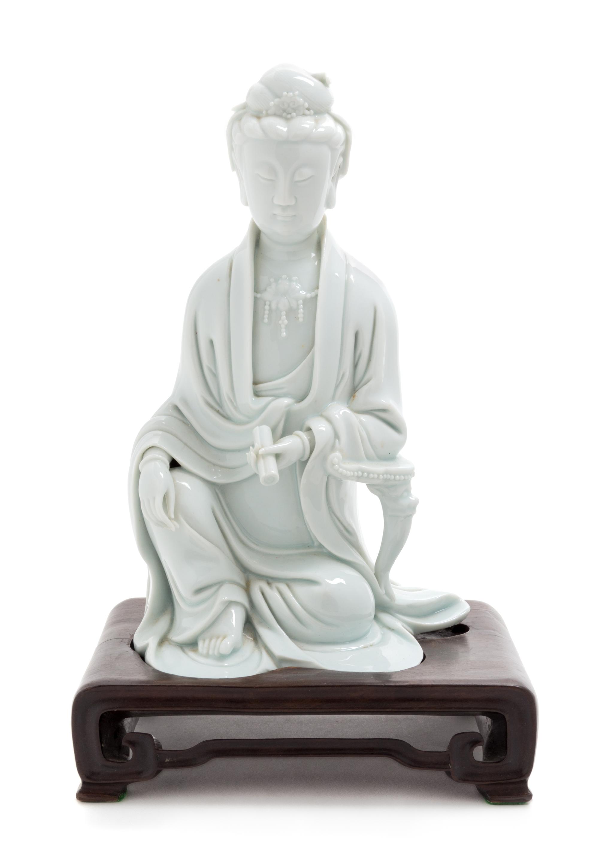 A Blanc-de-Chine Porcelain Figure of Guanyin Height 8 1/2 inches. — 20TH CENTURY