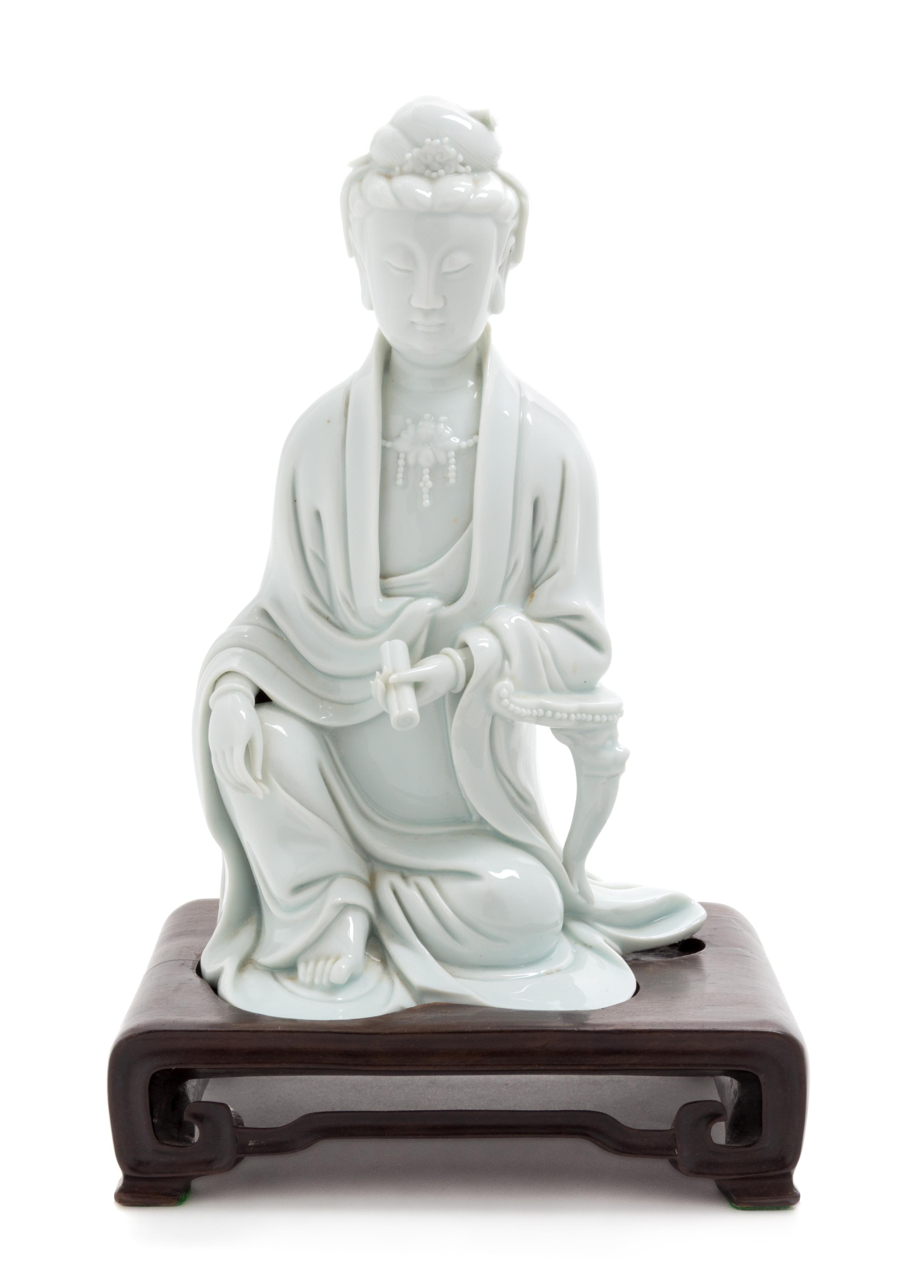 A Blanc-de-Chine Porcelain Figure of Guanyin Height 8 1/2 inches. — 20TH CENTURY