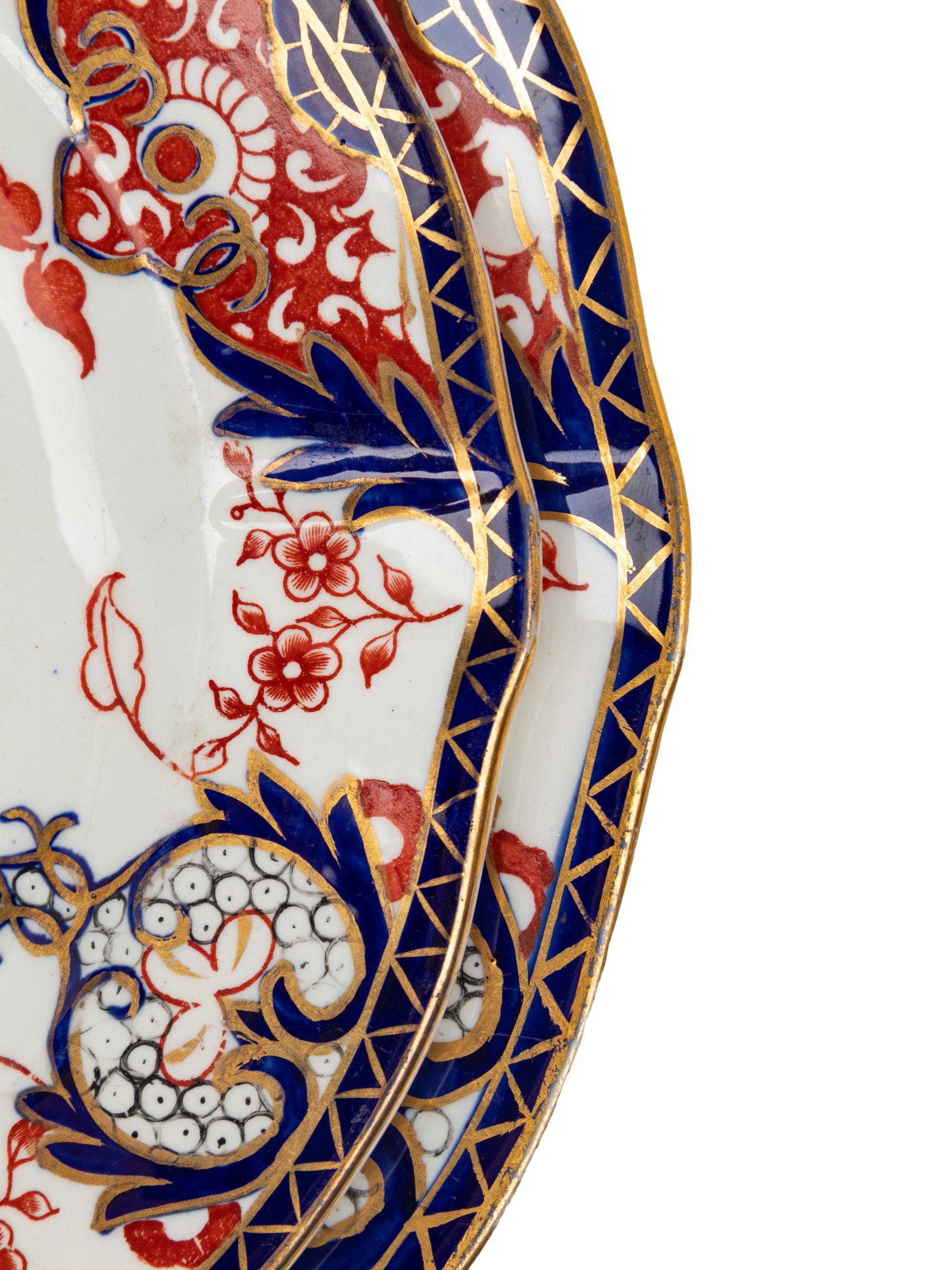 An Assembled Royal Crown Derby Porcelain Dinner Service