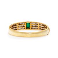 YELLOW GOLD, EMERALD, AND DIAMOND BANGLE BRACELET