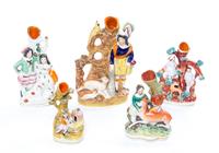 A Collection of Five Staffordshire Spill Vases Height of tallest 9 1/8 inches.