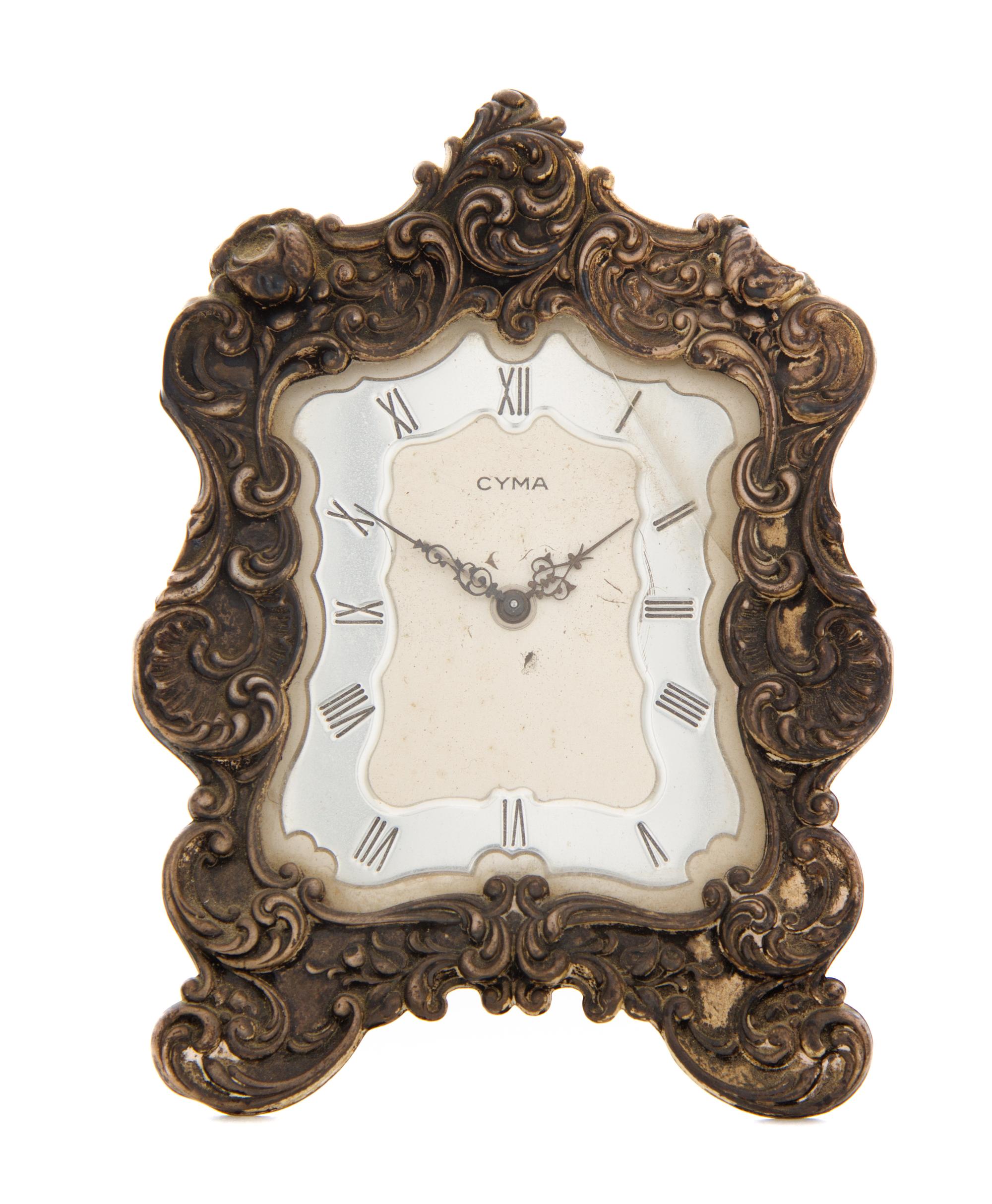 An American Silver Mounted Swiss Desk Clock, Case by Gorham Mfg. Co., Providence, RI, 20th Century, with works by Cyma, having an elong