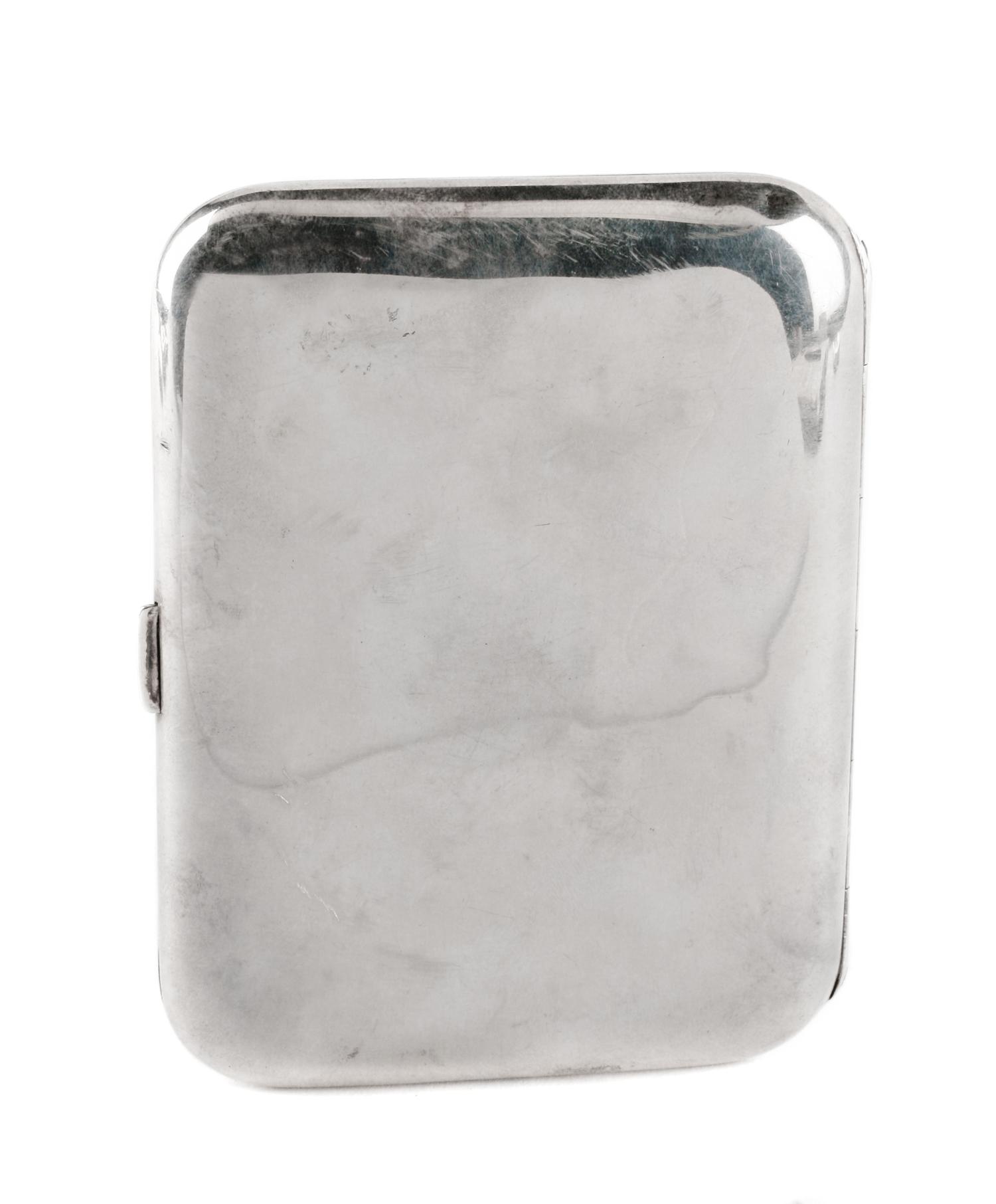 An Enameled Silver Cigarette Case, Likely American, Early 20th Century, the lid enameled to show a partially draped nude holding a hand