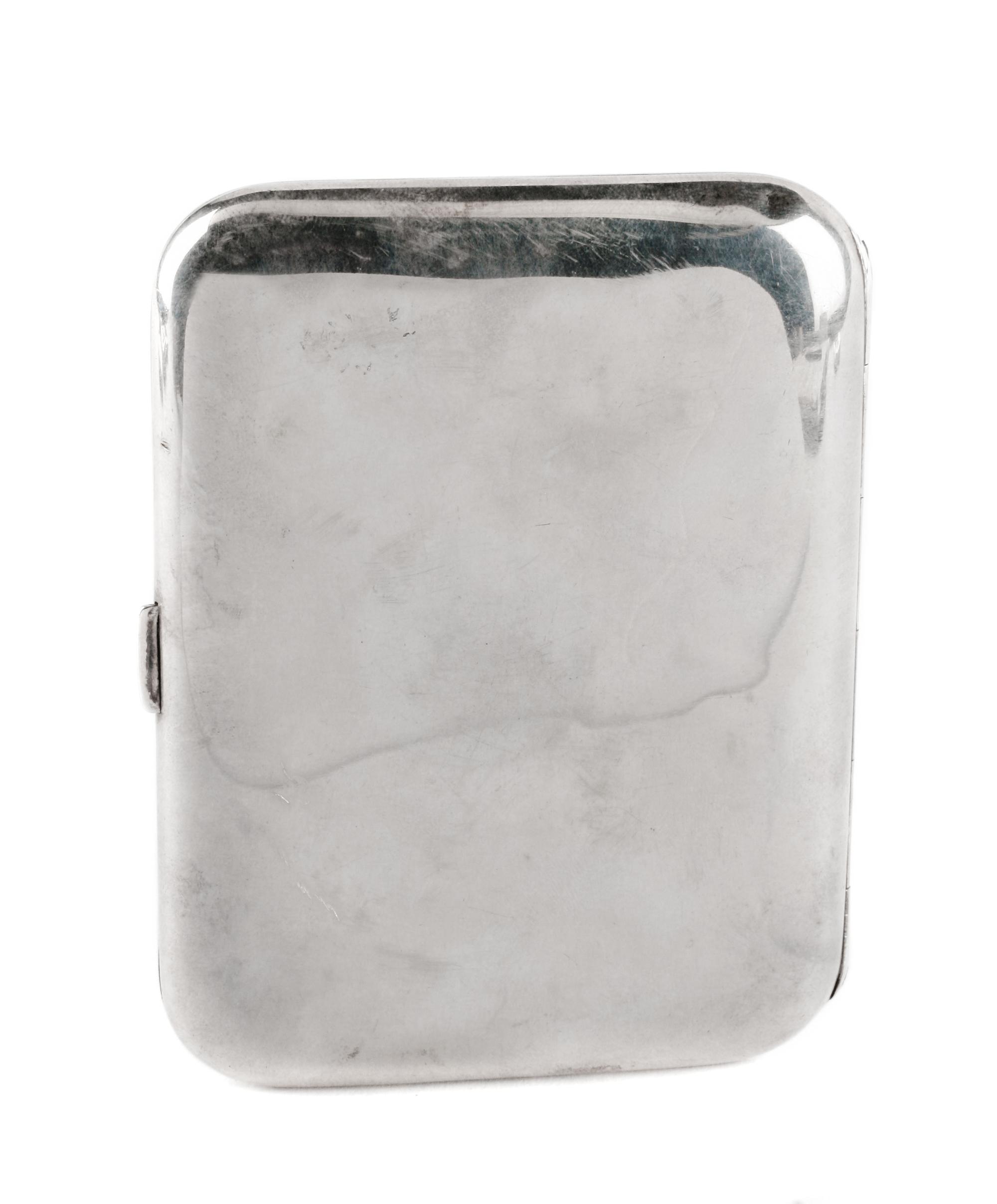 An Enameled Silver Cigarette Case, Likely American, Early 20th Century, the lid enameled to show a partially draped nude holding a hand