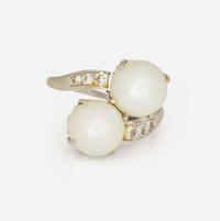 A Platinum, Cultured Pearl, and Diamond Ring
