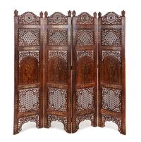 An Anglo-Indian Carved Four-Panel Floor Screen