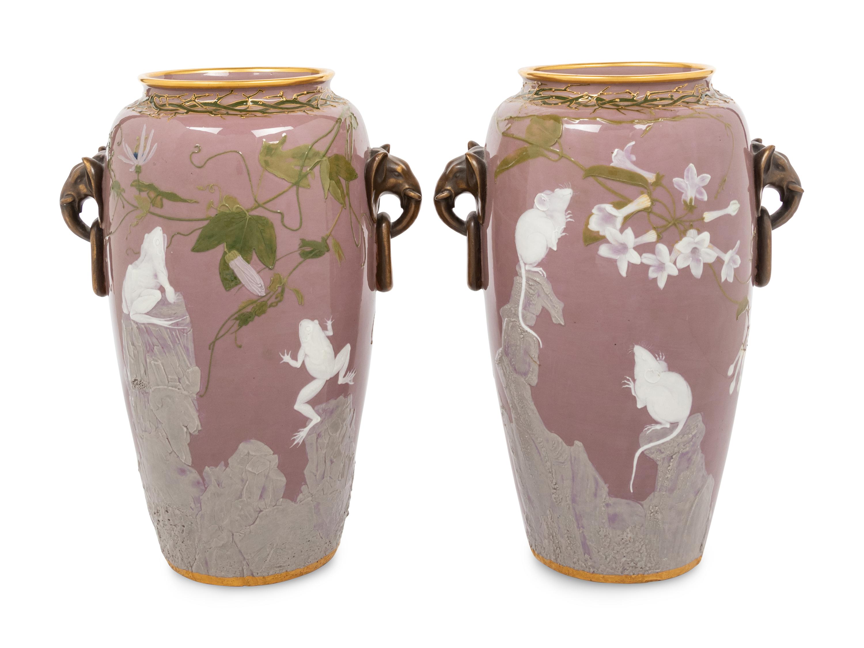 A Pair of Mintons Pate-sur-Pate Elephant Handle Urns