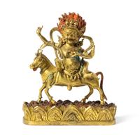 A Sino-Tibetan Gilt Bronze Figure of a Bodhisattva Height of 10 3/4 inches.