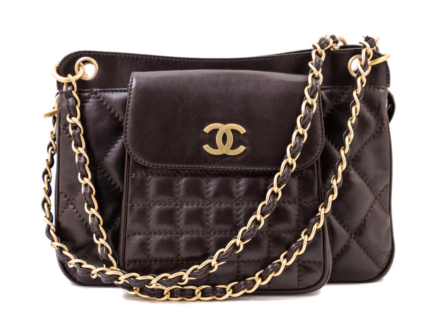 A Chanel Brown Leather Quilted Handbag, 12" x 8" x 3.5"; Strap drop: 10".
