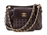 A Chanel Brown Leather Quilted Handbag, 12" x 8" x 3.5"; Strap drop: 10".