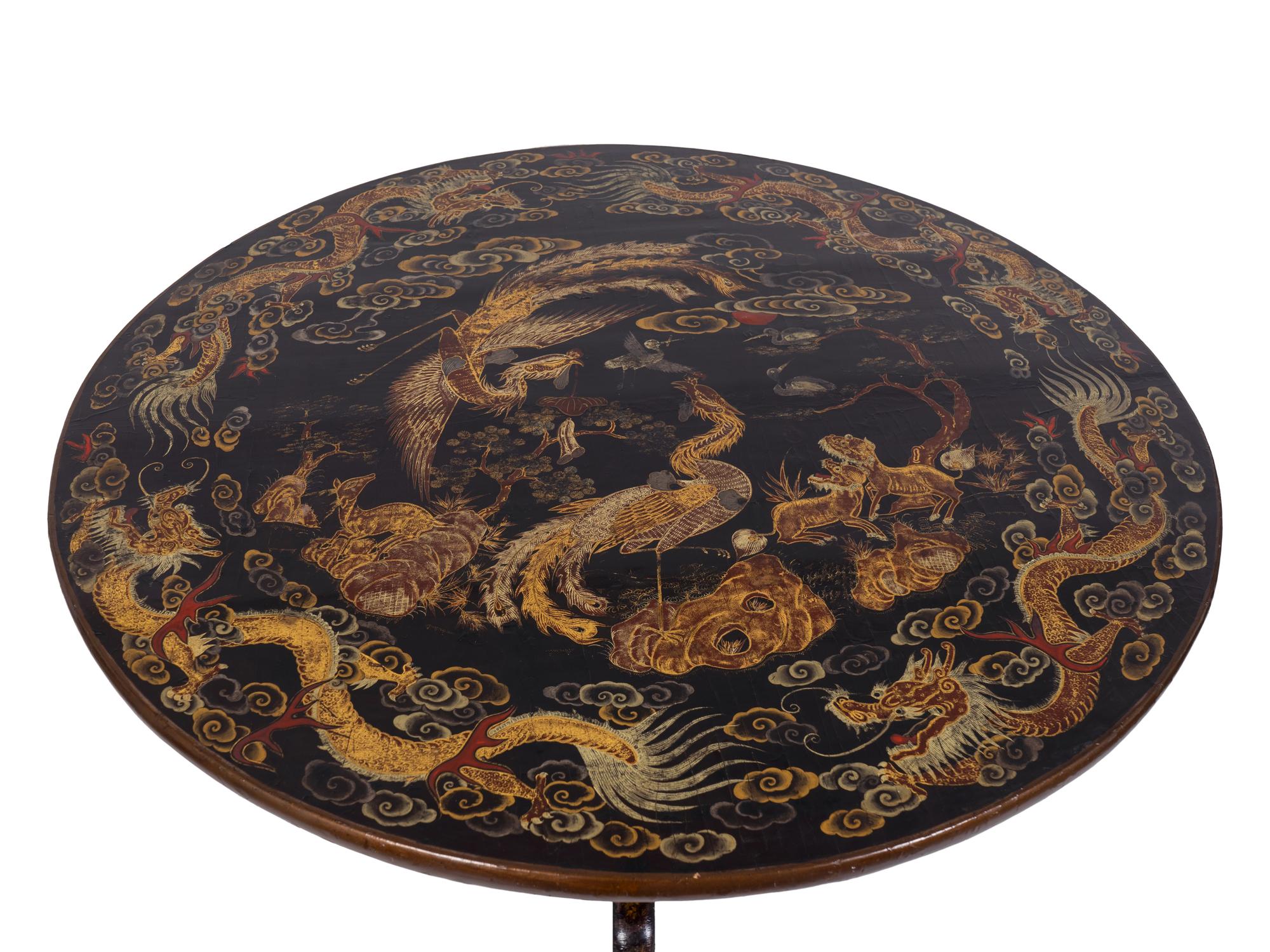 A Chinese Export Gilt-Decorated Black Lacquer Tilt-Top Tripod Table — FIRST HALF-19TH CENTURY