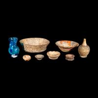 Eight Western Asiatic and Greco-Roman Terracotta, Alabaster, and Blue Glass Vessels