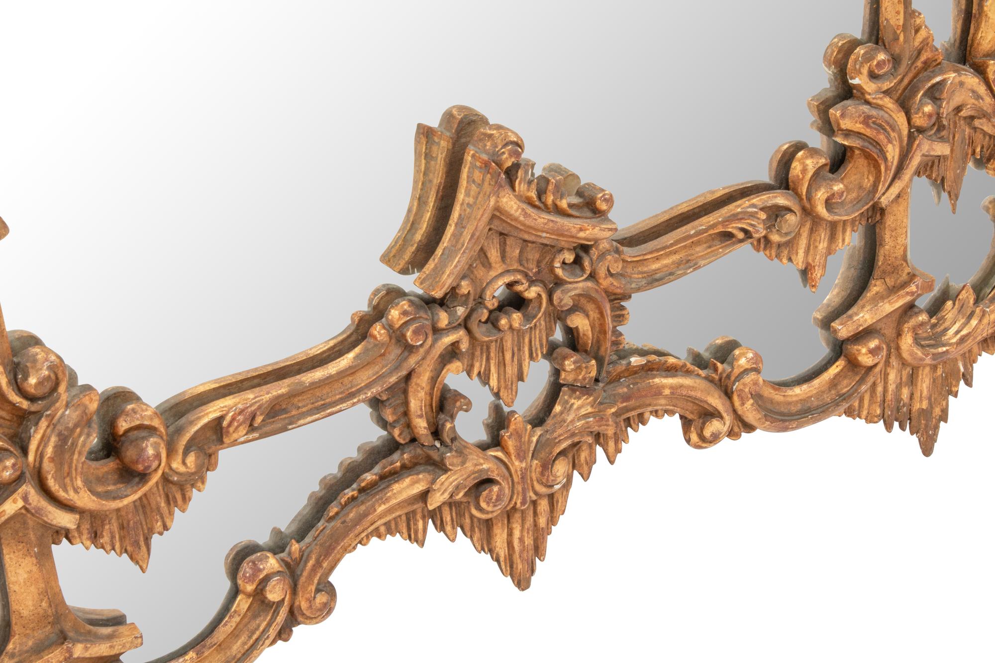 A George III “Chinese Chippendale” Style Giltwood Mirror