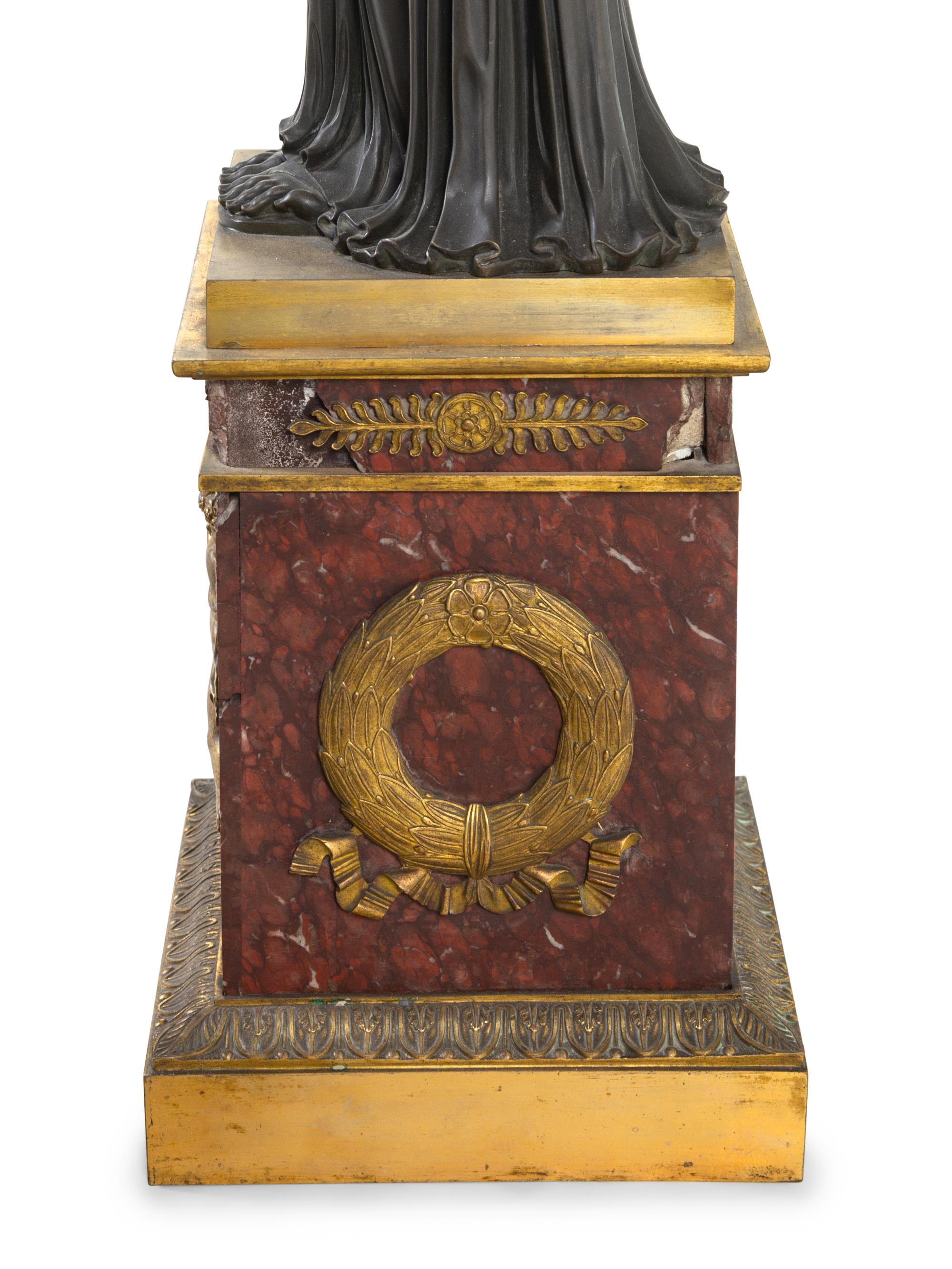 A Pair of Large Empire Style Gilt and Patinated Bronze and Marble Figural Candelabra Bases