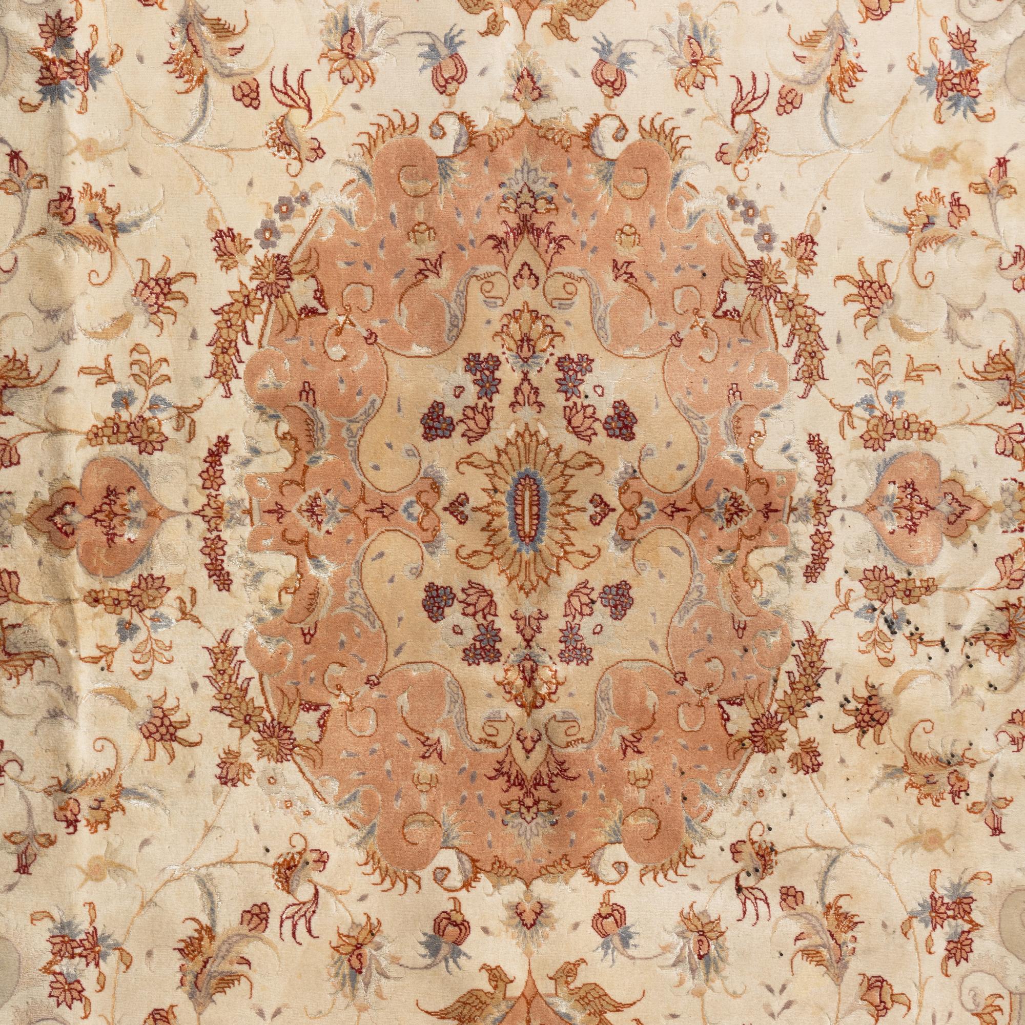 A Tabriz Silk Carpet