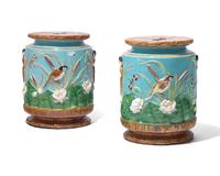 An assembled pair of English majolica "bird and pond" garden seat / stools, George Jones & Sons, Stoke, Stoke-on-Trent, bearing date marks for 1874-1875